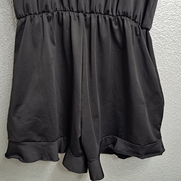 Black Romper With A Ruffled Short/Swimsuit - Picture 6 of 9